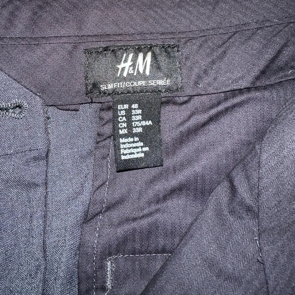 H&M slim fit suit pants, dark grey, size 33R (US).